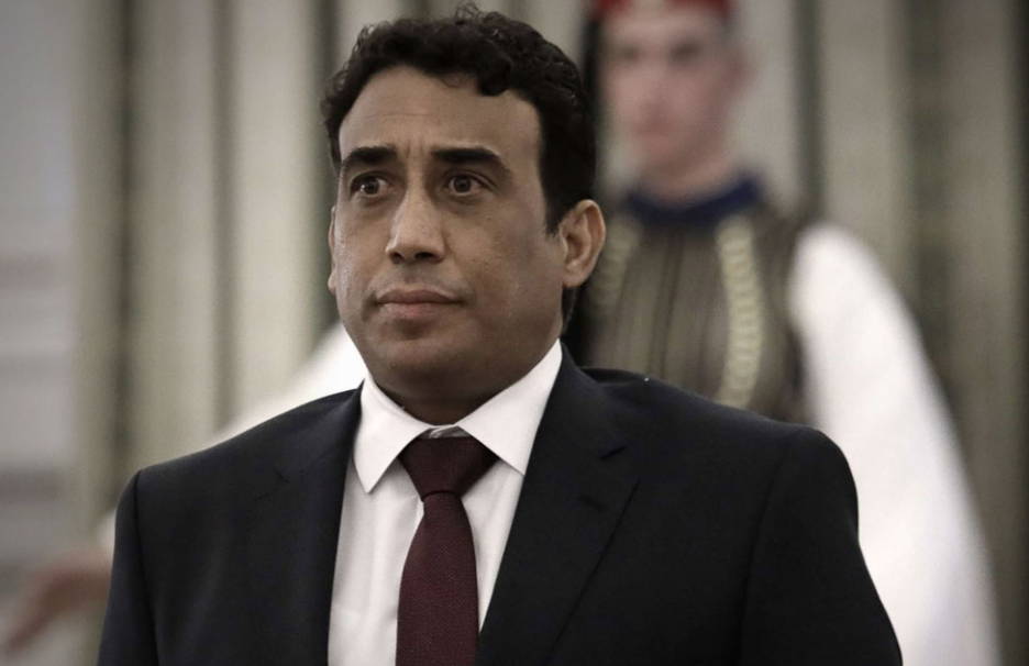 من هو محمد المنفي رئيس المجلس الرئاسي بليبيا؟