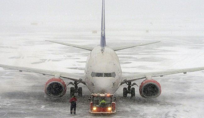 عاصفة ثلجية تشل حركة الطيران بالمطارات الأمريكية